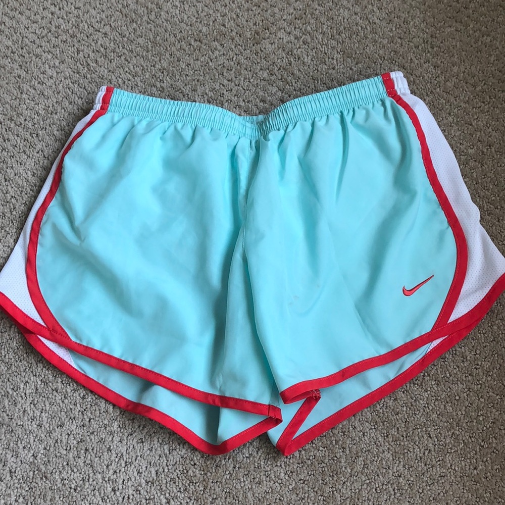 Mint/bright red Nike running shorts